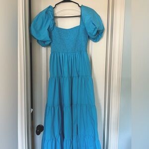 Super cute boutique smocked maxi dress- can be worn off shoulders or on!